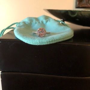 Purple topaz stone. Diamonds around